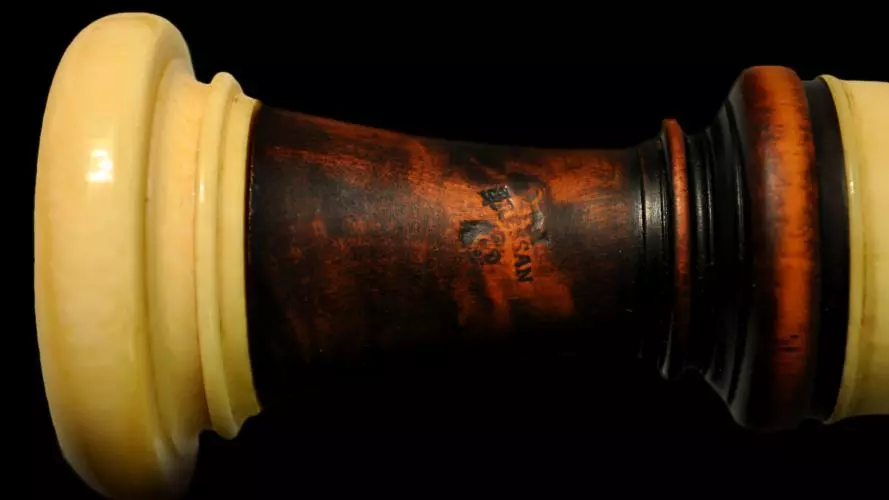 end piece with stamp 